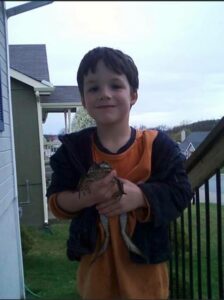 This boy had a ridiculous love for frogs! And mud!