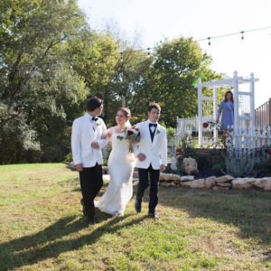 Brett and big brother Ethan walking mom down the aisle